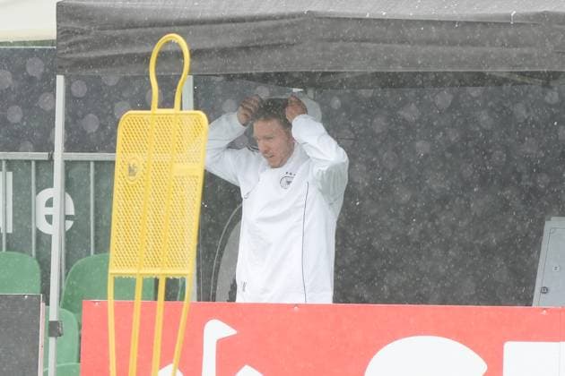 National coach Julian Nagelsmann Germany Germany runs through the rain Blankenhain 30 05 2024 Training camp for the German national team in preparation for the European Championship, Golf Resort Weimarer Land