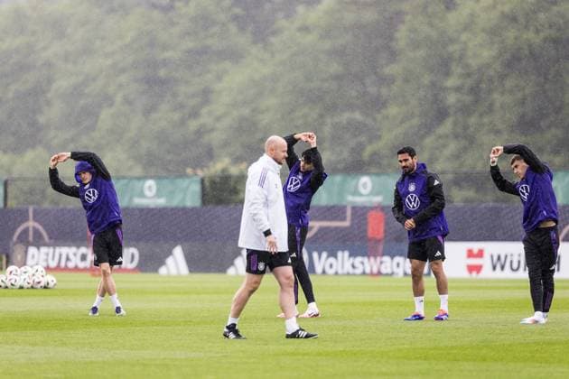 DFB training camp training 30 05 2024 Warm up in the pouring rain Florian Wirtz Germany , Aleksandar Pavlovic Germany , Ilkay Gündogan Germany , Brajan Gruda Germany DFB training camp training Blankenhain, Golf Spa Resort Weimarer Land on 30 05 2024 Copyright: xBEAUTIFULxSPORTS Wunderlx