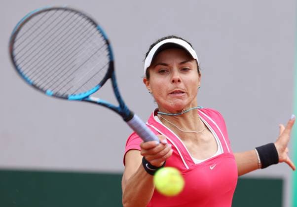 (240530) -- PARIS, May 30, 2024 -- Viktoriya Tomova of Bulgaria hits a return during the women s singles second round match between Wang Xinyu of China and Viktoriya Tomova of Bulgaria at the French Open tennis tournament at Roland Garros in Paris, France, May 30, 2024. ) (SP)FRANCE-PARIS-TENNIS-FRENCH OPEN-WOMEN S SINGLES GaoxJing 