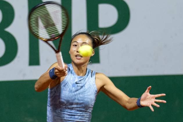 (240531) -- PARIS, May 31, 2024 -- Zheng Qinwen hits a return during the women s singles second round match between Zheng Qinwen of China and Tamara Korpatsch of Germany at the French Open tennis tournament at Roland Garros, Paris, France, May 30, 2024. ) (SP)FRANCE-PARIS-TENNIS-FRENCH OPEN-WOMEN S SINGLES MengxDingbo 