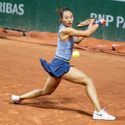 (240531) -- PARIS, May 31, 2024 -- Zheng Qinwen hits a return during the women s singles second round match between Zheng Qinwen of China and Tamara Korpatsch of Germany at the French Open tennis tournament at Roland Garros, Paris, France, May 30, 2024. ) (SP)FRANCE-PARIS-TENNIS-FRENCH OPEN-WOMEN S SINGLES MengxDingbo 