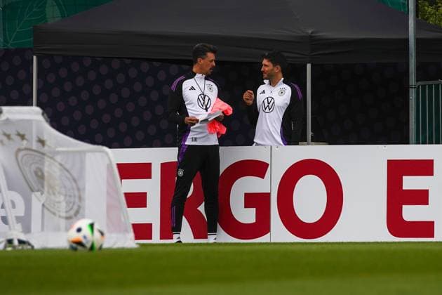 Co-coach assistant coach Sandro Wagner Germany Germany in conversation with co-coach assistant coach Benjamin Glück Germany Germany MAX Blankenhain 31 05 2024 Training camp for the German national team in preparation for the European Championship, Golf Resort Weimarer Land