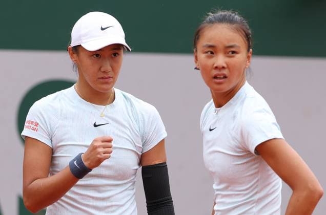 (240531) -- PARIS, May 31, 2024 -- Wang Xiyu (L) Yuan Yue react during the women s doubles first round match between Wang Xiyu Yuan Yue of China and Leolia Jeanjean Jessika Ponchet of France at the French tennis tournament in Paris, France, May 31, 2024. ) (SP)FRANCE-PARIS-TENNIS-FRENCH OPEN-WOMEN S DOUBLES GaoxJing 