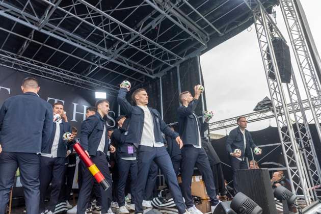 Report 31 05 2024 Arrival party of the German mens national team at adidas in Herzogenaurach in pouring rain From the stage, the national players give balls and shirts with the shirt cannon to the fans Herzogenaurach Bavaria Germany