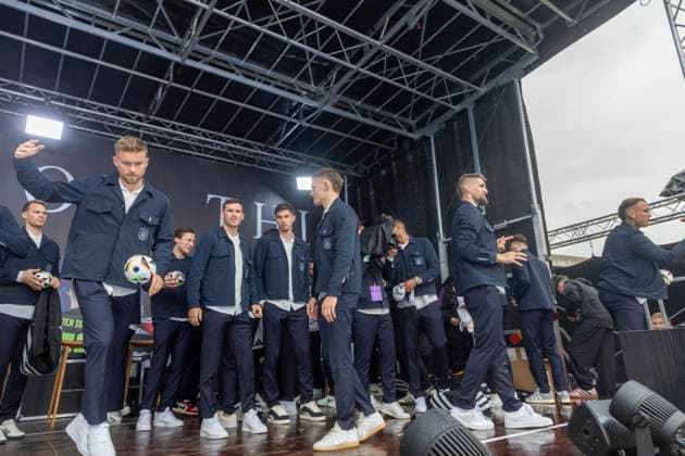 Report 31 05 2024 Arrival party of the German mens national team at adidas in Herzogenaurach in pouring rain From the stage, the national players give balls and shirts with the shirt cannon to the fans Herzogenaurach Bavaria Germany