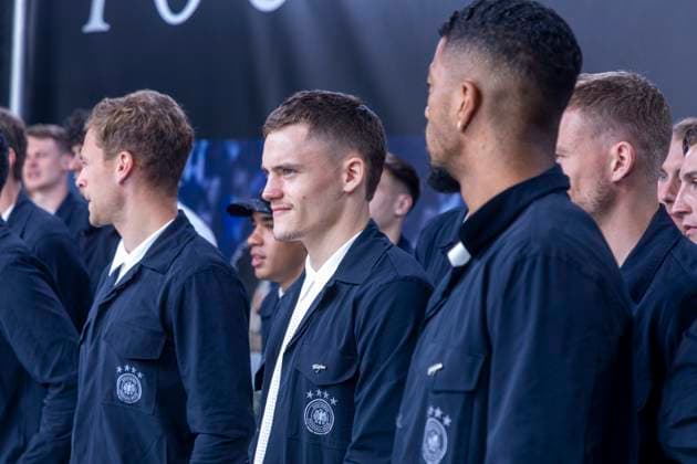 Report 31 05 2024 Arrival party of the German mens national team at adidas in Herzogenaurach in pouring rain Florian Wirtz with his teammates Herzogenaurach Bavaria Germany