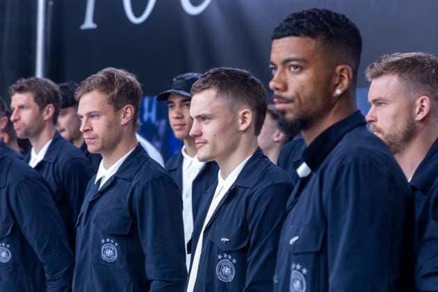 Report 31 05 2024 Arrival party of the German mens national team at adidas in Herzogenaurach in pouring rain Florian Wirtz with his teammates Herzogenaurach Bavaria Germany