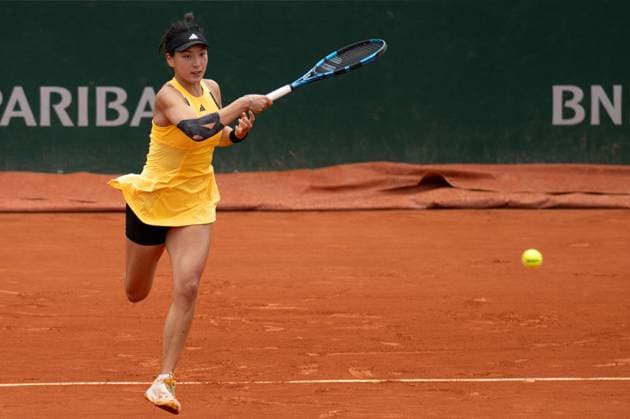 (240601) -- PARIS, June 1, 2024 -- Wang Xinyu hits a return during the women s singles third round match between Wang Xinyu of China and Anastasia Potapova of Russia at the French Open tennis tournament at Roland Garros, Paris, France, May 31, 2024. ) (SP)FRANCE-PARIS-TENNIS-FRENCH OPEN-WOMEN S SINGLES MengxDingbo 