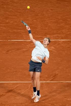 (240601) -- PARIS, June 1, 2024 -- Sebastian Korda hits a return during the men s singles third round match between Carlos Alcaraz of Spain and Sebastian Korda of the United States at the French Open tennis tournament at Roland Garros, Paris, France, May 31, 2024. ) (SP)FRANCE-PARIS-TENNIS-FRENCH OPEN-MEN S SINGLES MengxDingbo 