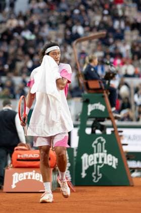 (240601) -- PARIS, June 1, 2024 -- Zhang Zhizhen of China reacts during the men s singles third round match between Zhang Zhizhen of China and Stefanos Tsitsipas of Greece at the French Open tennis tournament at Roland Garros, Paris, France, May 31, 2024. ) (SP)FRANCE-PARIS-TENNIS-FRENCH OPEN-MEN S SINGLES MengxDingbo 