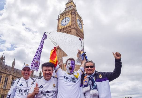 June 1, 2024, London, England, UK: Real Madrid fans hold a large cardboard trophy next to Big Ben ahead of the Champions League soccer final at Wembley Stadium, as Borussia Dortmund face off with Real Madrid. London UK - ZUMAv130 0492763982st Copyright: xVukxValcicx