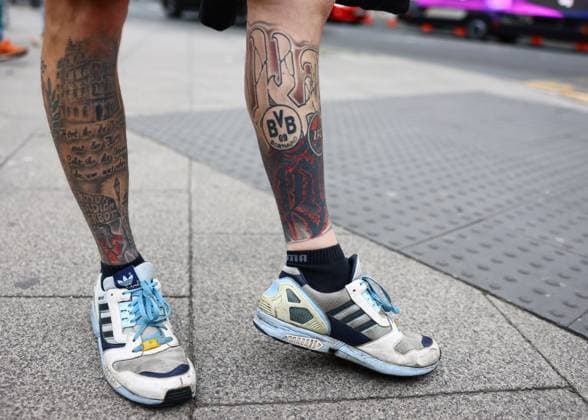 London, England, 1st June 2024. Borussia Dortmund fan and his leg tatoos during the UEFA Champions League final match at Wembley Stadium, London. Picture credit should read: David Klein Sportimage EDITORIAL USE ONLY. No use with unauthorised audio, video, data, fixture lists, club league logos or live services. Online in-match use limited to 120 images, no video emulation. No use in betting, games or single club league player publications. SPI-3169-0019