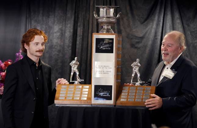June 1, 2024, Frankenmuth, Mi, USA: Moose Jaw Warriors Jagger Firkus, left, is presented the Canadian Hockey League David Branch Player of the Year trophy by Ontario Hockey League Commissioner David Branch in Frankenmuth, Mich., Saturday, June 1, 2024. Canada News - June 1, 2024  - ZUMAc35_ 20240601_zaf_c35_005 Copyright: xDuanexBurlesonx