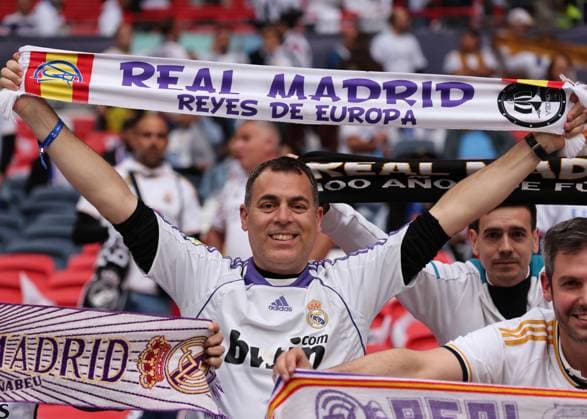 London, England, 1st June 2024. Real Madrid fans get ready for the game during the UEFA Champions League final match at Wembley Stadium, London. Picture credit should read: David Klein Sportimage EDITORIAL USE ONLY. No use with unauthorised audio, video, data, fixture lists, club league logos or live services. Online in-match use limited to 120 images, no video emulation. No use in betting, games or single club league player publications. SPI-3169-0029