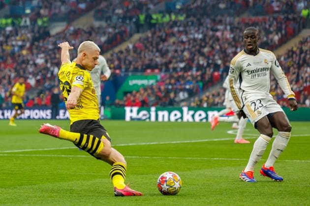 UEFA Champions League Final 2024 Borussia Dortmund Real Madrid London, England 20240601 Borussia Dortmunds Julian Ryerson from Lyngdal against Real Madrids Ferland Mendy during the Champions League Final between Borussia Dortmund and Real Madrid at Wembley Stadium Photo Svein Ove Ekornesvag NTB London England EDITORIAL USE ONLY RESTRICTED USE FOR BETTING COMPANIES  Copyright: xSveinxOvexEkornesvagx xNTBx