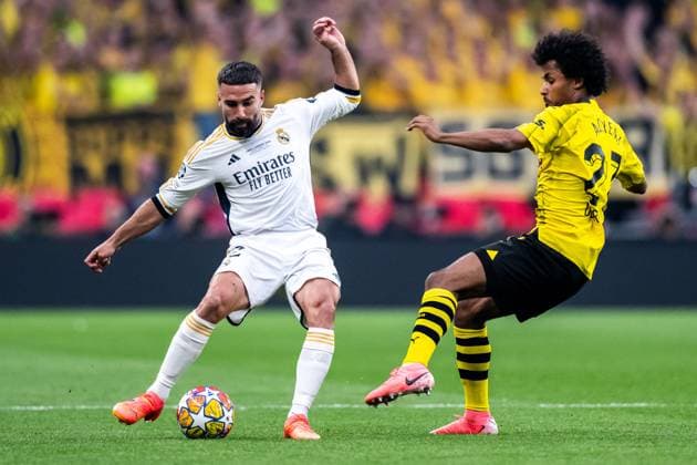 240601 Dani Carvajal of Real Madrid and Karim Adeyemi of Dortmund during the UEFA Champions League final between Dortmund and Real Madrid on June 1, 2024 in London Photo Petter Arvidson BILDBYRAN kod PA PA0818 fotboll football soccer fotball champions league final dortmund real madrid bbeng  Copyright: PETTERxARVIDSON BB240601PA085
