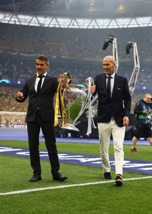London, England, 1st June 2024. Karl-Heinz Riedle and Zinedine Zidane present the UEFA Champions League Trophy prior to the UEFA Champions League final match at Wembley Stadium, London. Picture credit should read: David Klein Sportimage EDITORIAL USE ONLY. No use with unauthorised audio, video, data, fixture lists, club league logos or live services. Online in-match use limited to 120 images, no video emulation. No use in betting, games or single club league player publications. SPI-3169-0079
