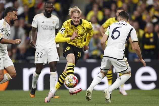 LONDON - (l-r) Daniel Carvajal of Real Madrid, Julian Brandt of Borussia Dortmund, Nacho of Real Madrid during the UEFA Champions League Final between Borussia Dortmund and Real Madrid at Wembley Stadium on June 1, 2024 in London, United Kingdom. ANP Hollandse Hoogte MAURICE VAN STEEN UEFA Champions League 2023 24 FINAL 2024 xVIxANPxSportx xVanxSteenxFotografiexIVx 500095551 originalFilename: 500095551.jpg