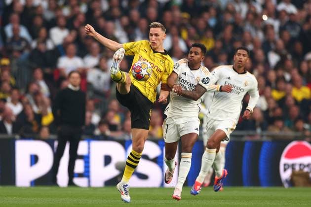 1st June 2024; Wembley Stadium, London, England; UEFA Champions League Football Final, Borussia Dortmund versus Real Madrid; Nico Schlotterbeck of Borussia Dortmund competes for the ball with Rodrygo of Real Madrid  ActionPlus12649826 ShaunxBrooks