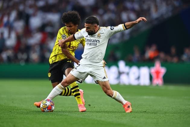 SOCCER - UEFA CL, Dortmund vs Madrid LONDON,ENGLAND,01.JUN.24 - SOCCER - UEFA Champions League, final, Borussia Dortmund vs Real Madrid CF. Image shows Karim Adeyemi (Dortmund) and Daniel Carvajal (Madrid).  GEPAxpictures xMichaelxZemanek