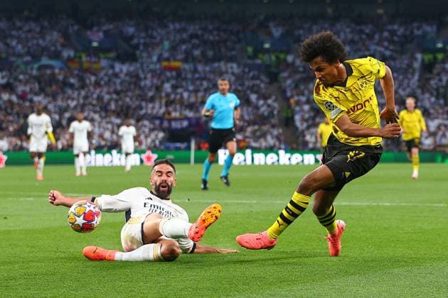 SOCCER - UEFA CL, Dortmund vs Madrid LONDON,ENGLAND,01.JUN.24 - SOCCER - UEFA Champions League, final, Borussia Dortmund vs Real Madrid CF. Image shows Karim Adeyemi (Dortmund) and Daniel Carvajal (Madrid).  GEPAxpictures xMichaelxZemanek