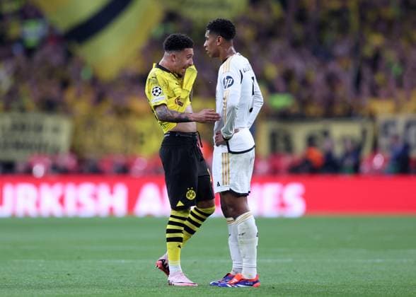 London, England, 1st June 2024. Jadon Sancho of Borussia Dortmund talks to Jude Bellingham of Real Madrid during the UEFA Champions League final match at Wembley Stadium, London. Picture credit should read: David Klein Sportimage EDITORIAL USE ONLY. No use with unauthorised audio, video, data, fixture lists, club league logos or live services. Online in-match use limited to 120 images, no video emulation. No use in betting, games or single club league player publications. SPI-3169-0088