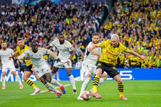 UEFA Champions League Final 2024 Borussia Dortmund Real Madrid London, England 20240601 Borussia Dortmunds Julian Ryerson in a duel with Real Madrids Nacho during the Champions League Final between Borussia Dortmund and Real Madrid at Wembley Stadium Photo Svein Ove Ekornesvag NTB London England EDITORIAL USE ONLY RESTRICTED USE FOR BETTING COMPANIES  Copyright: xSveinxOvexEkornesvagx xNTBx