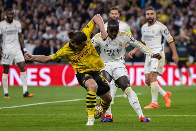 Football - 2023 2024 UEFA Champions League - Final - Borussia Dortmund vs Real Madrid - Wembley Stadium, London - Saturday 1st June 2024 Marcel Sabitzer (Borussia Dortmund) and Ferland Mendy (Real Madrid) compete for the ball at Wembley Stadium COLORSPORT DANIEL BEARHAM  csp_bor_reaM_db_01062024