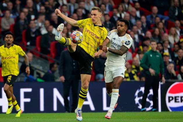 Nico Schlotterbeck of Borussia Dortmund and Rodrigo Silva de Goes of Real Madrid CF compete for the ball during the 2023 2024 Champions League Final football match between Borussia Dortmund and Real Madri CF at Wembley stadium in London (England), June 1st, 2024. cesarexpurini