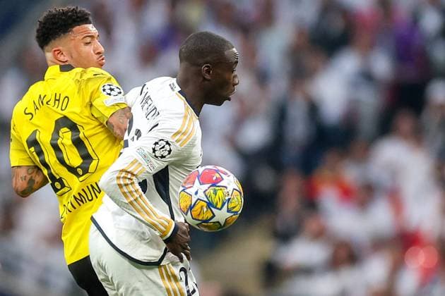 Borussia Dortmund v Real Madrid CF - UEFA Champions League Final 2023 24 LONDON, ENGLAND - JUNE 1: Jadon Sancho of Dortmund in action against Ferland Mendy of Real Madrid during the UEFA Champions League 2023 24 final match between Borussia Dortmund v Real Madrid CF at Wembley Stadium on June 1, 2024 in London, England. SanjinxStrukic PIXSELL