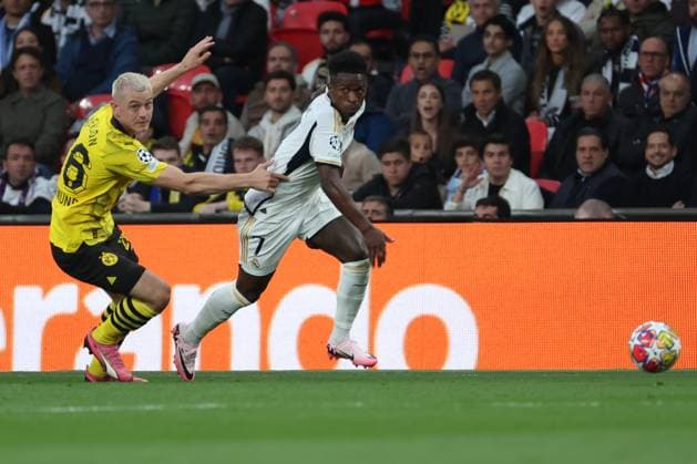 Real Madrid s Vinicius Jr (R) in action against Dortmund s Julian Ryerson (L) during the UEFA Champions League final soccer match between Borussia Dortmund and Real Madrid, in London, Britain, 01 June 2024. UEFA Champions League final - Borussia Dortmund vs Real Madrid !ACHTUNG: NUR REDAKTIONELLE NUTZUNG!  Copyright: xKikoxHuescax GRAF2806 0492768971st