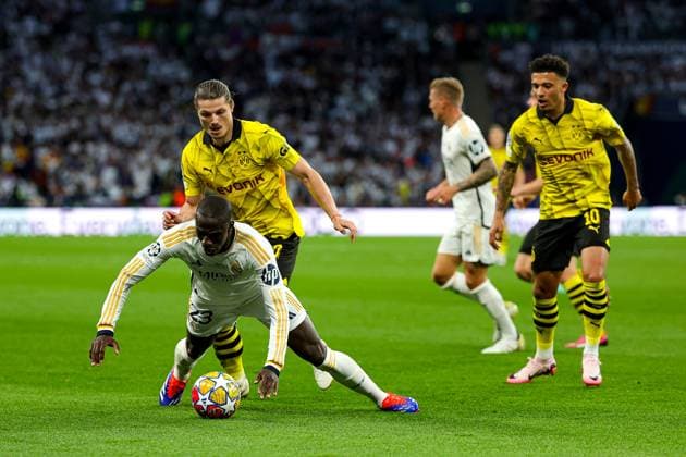 Borussia Dortmund v Real Madrid Champions League 01 06 2024. Final Marcel Sabitzer (20) of Borussia Dortmund brings down Ferland Mendy (23) of Real Madrid during the Champions League Final match between Borussia Dortmund and Real Madrid at Wembley Stadium, London, England on 1 June 2024. Editorial use only , Copyright: xNigelxKeenex PSI-19804-0050