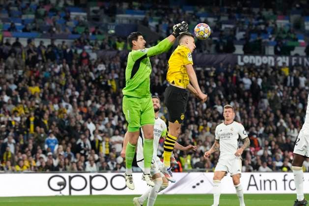 Torhueter Thibaut Courtois (Real Madrid) und Nico Schlotterbeck (Borussia Dortmund) battle for the ball, UEFA Champions League 2023 24 - Final, Borussia Dortmund vs Real Madrid CF, Wembley Stadium, June 1, 2024, London, United Kingdom.