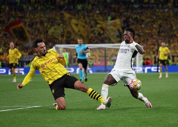 London, England, 1st June 2024. Mats Hummels of Borussia Dortmund tackles Vinicius Junior of Real Madrid during the UEFA Champions League final match at Wembley Stadium, London. Picture credit should read: David Klein Sportimage EDITORIAL USE ONLY. No use with unauthorised audio, video, data, fixture lists, club league logos or live services. Online in-match use limited to 120 images, no video emulation. No use in betting, games or single club league player publications. SPI-3169-0101