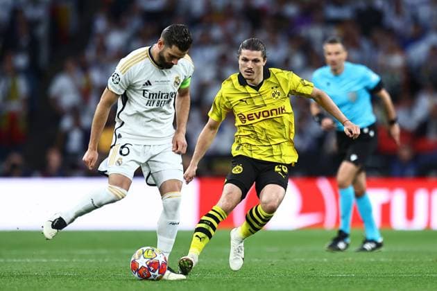 SOCCER - UEFA CL, Dortmund vs Madrid LONDON,ENGLAND,01.JUN.24 - SOCCER - UEFA Champions League, final, Borussia Dortmund vs Real Madrid CF. Image shows Nach Fernandez (Madrid) and Marcel Sabitzer (Dortmund).  GEPAxpictures xMichaelxZemanek