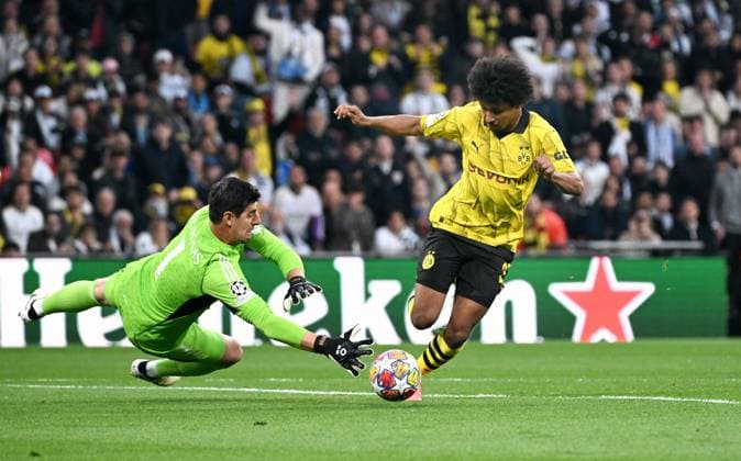 Football, Champions League Final, Season 2023 2024, Wembley Stadium London Bor Dortmund Real Madrid Karim Adeyemi BVB , Thibaut Courtois RMA Action UEFA REGULATES PROHIBIT ANY USE OF PHOTOGRAPHS AS IMAGE SEQUENCES AND OR QUASI VIDEO