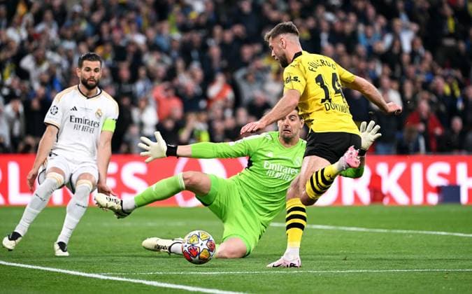 Football, Champions League Final, Season 2023 2024, Wembley Stadium London Bor Dortmund Real Madrid Niclas Füllkrug BVB , Thibaut Courtois RMA Action UEFA REGULATES PROHIBIT ANY USE OF PHOTOGRAPHS AS IMAGE SEQUENCES AND OR QUASI VIDEO
