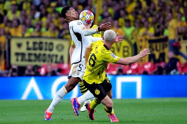 Jude Bellingham of Real Madrid CF and Julian Ryerson of Borussia Dortmund during the 2023 2024 Champions League Final football match between Borussia Dortmund and Real Madri CF at Wembley stadium in London (England), June 1st, 2024. cesarexpurini