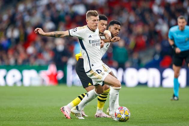 Toni Kroos (Real Madrid) und Jadon Sancho (Borussia Dortmund) battle for the ball, UEFA Champions League 2023 24 - Final, Borussia Dortmund vs Real Madrid CF, Wembley Stadium, June 1, 2024, London, United Kingdom.