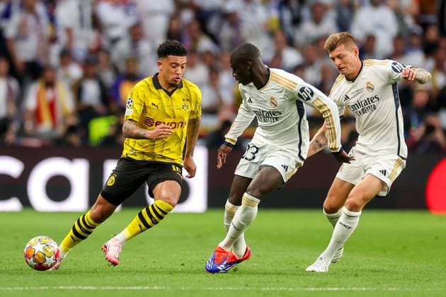 Borussia Dortmund v Real Madrid CF - UEFA Champions League Final 2023 24 LONDON, ENGLAND - JUNE 1: Jadon Sancho of Dortmund and Ferland Mendy of Real Madrid in action during the UEFA Champions League 2023 24 final match between Borussia Dortmund v Real Madrid CF at Wembley Stadium on June 1, 2024 in London, England. SanjinxStrukic PIXSELL