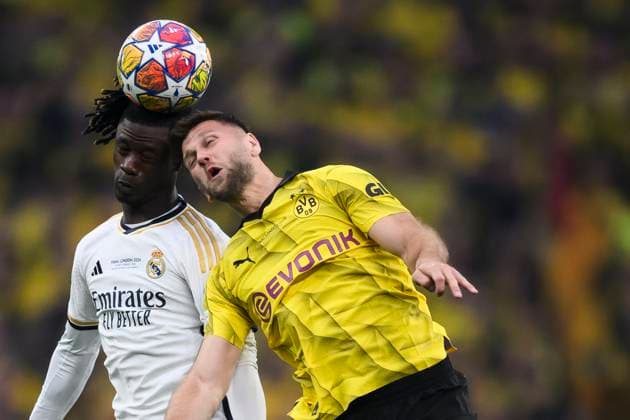 Borussia Dortmund v Real Madrid CF - UEFA Champions League Eduardo Camavinga of Real Madrid CF competes for a header with Niclas Fullkrug of Borussia Dortmund during the UEFA Champions League final football match between Borussia Dortmund and Real Madrid CF. London United Kingdom Copyright: xNicolòxCampox
