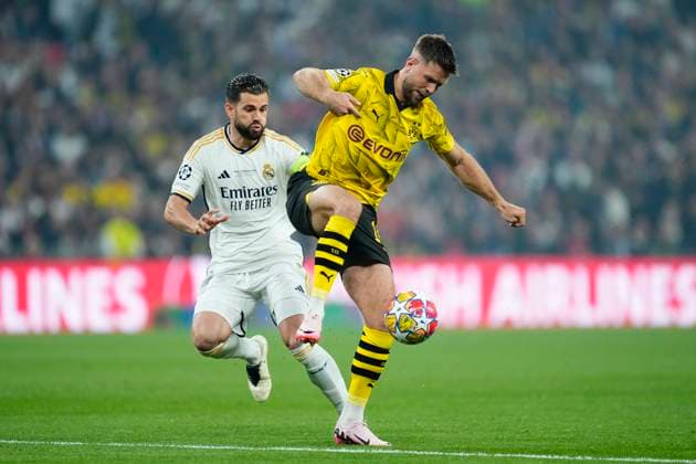 Borussia Dortmund v Real Madrid CF - UEFA Champions League Final 2023 24 Nacho Fernandez centre-back of Real Madrid and Spain competes for the ball with Niclas Fullkrug centre-forward of Borussia Dortmund and Germany during the UEFA Champions League 2023 24 final match between Borussia Dortmund v Real Madrid CF at Wembley Stadium on June 1, 2024 in London, England. London England United Kingdom  Copyright: xJosexBretonx originalFilename:breton-borussia240601_npCwy.jpg