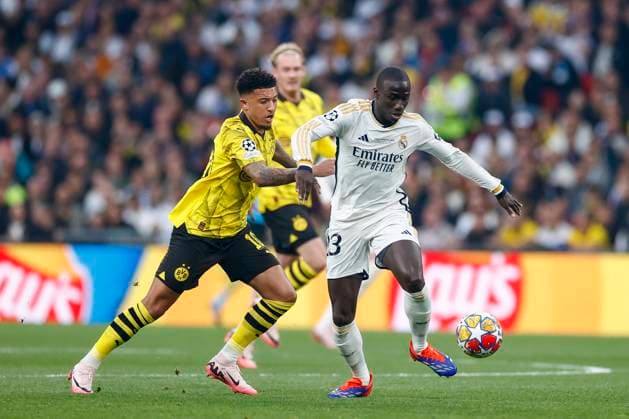 Jadon Sancho (Borussia Dortmund) und Ferland Mendy (Real Madrid) battle for the ball, UEFA Champions League 2023 24 - Final, Borussia Dortmund vs Real Madrid CF, Wembley Stadium, June 1, 2024, London, United Kingdom.