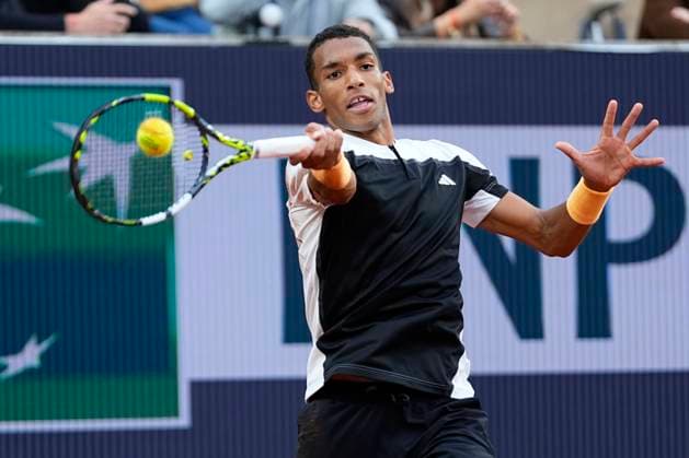 PARIS, FRANCE - JUNE 1: Felix Auger-Aliassime of Canada plays a forehand shot during the 3rd round of Roland Garros 2024 match between Ben Shelton vs Felix Auger-Aliassime at Roland Garros Stadium on June 1, 2024 in Paris, France. (Photo by Glenn Gervot Icon Sportswire) TENNIS: JUN 01 Roland-Garros EDITORIAL USE ONLY Icon2024060106312024