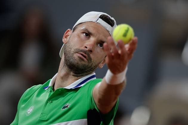 01 06 2024 Tennis, French Open 2024 Roland Garros, FRA, Men™s Singles Court Philippe Chatrier THIRD ROUND Zizou Bergs BEL Grigor Dimitrov BUL Picture from left Grigor Dimitrov BUL makes a serve Copyright: HMBxMedia AntonioxBorga