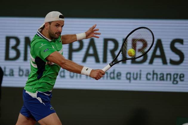 01 06 2024 Tennis, French Open 2024 Roland Garros, FRA, Men™s Singles Court Philippe Chatrier THIRD ROUND Zizou Bergs BEL Grigor Dimitrov BUL Picture from left Grigor Dimitrov BUL plays a backhand Copyright: HMBxMedia AntonioxBorga