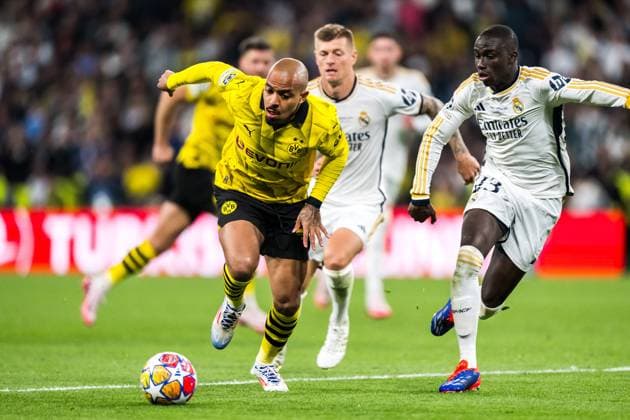 240601 Donyell Malen of Dortmund and Ferland Mendy of Real Madrid during the UEFA Champions League final between Dortmund and Real Madrid on June 1, 2024 in London Photo Petter Arvidson BILDBYRAN kod PA PA0818 fotboll football soccer fotball champions league final dortmund real madrid bbeng bbauto  Copyright: PETTERxARVIDSON BB240601PA213
