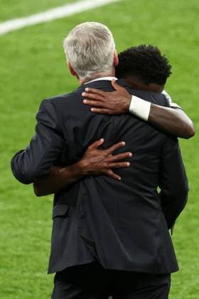 Vinicius Junior of Real Madrid celebrates scoring a goal for their side to make it 2-0 with Real Madrid manager Carlo Ancelotti Borussia Dortmund v Real Madrid, UEFA Champions League, Final, Football, Wembley Stadium, London, UK - 01 June 2024 EDITORIAL USE ONLY No use with unauthorised audio, video, data, fixture lists, club league logos or live services. Online in-match use limited to 120 images, no video emulation. No use in betting, games or single club league player publications.  Copyright: xPaulxCurrie Shutterstockx 14516316eb