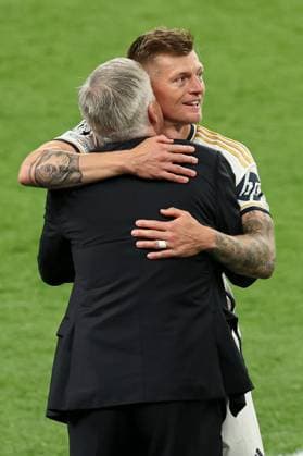 Toni Kroos of Real Madrid hugs Real Madrid manager Carlo Ancelotti in the technical area after they leave the pitch Borussia Dortmund v Real Madrid, UEFA Champions League, Final, Football, Wembley Stadium, London, UK - 01 June 2024 EDITORIAL USE ONLY No use with unauthorised audio, video, data, fixture lists, club league logos or live services. Online in-match use limited to 120 images, no video emulation. No use in betting, games or single club league player publications.  Copyright: xPaulxCurrie Shutterstockx 14516316ep