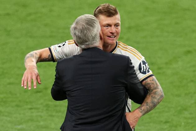 Toni Kroos of Real Madrid hugs Real Madrid manager Carlo Ancelotti in the technical area after they leave the pitch Borussia Dortmund v Real Madrid, UEFA Champions League, Final, Football, Wembley Stadium, London, UK - 01 June 2024 EDITORIAL USE ONLY No use with unauthorised audio, video, data, fixture lists, club league logos or live services. Online in-match use limited to 120 images, no video emulation. No use in betting, games or single club league player publications.  Copyright: xPaulxCurrie Shutterstockx 14516316eo